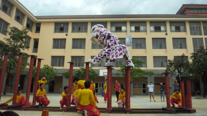 Stunts by the Lion Dance Troupe. Do not try this at home.